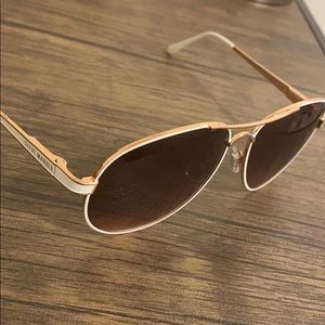 White and gold Steve Madden sunglasses